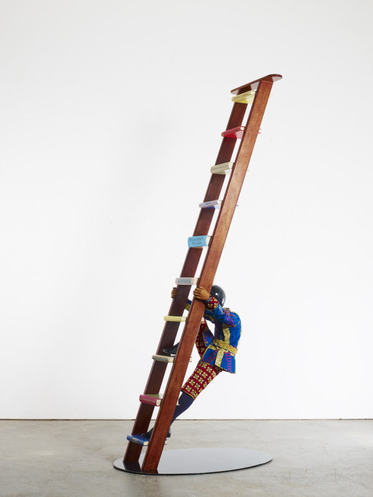 Photo of Shonibare Art work, child ascending ladder from bottom.
